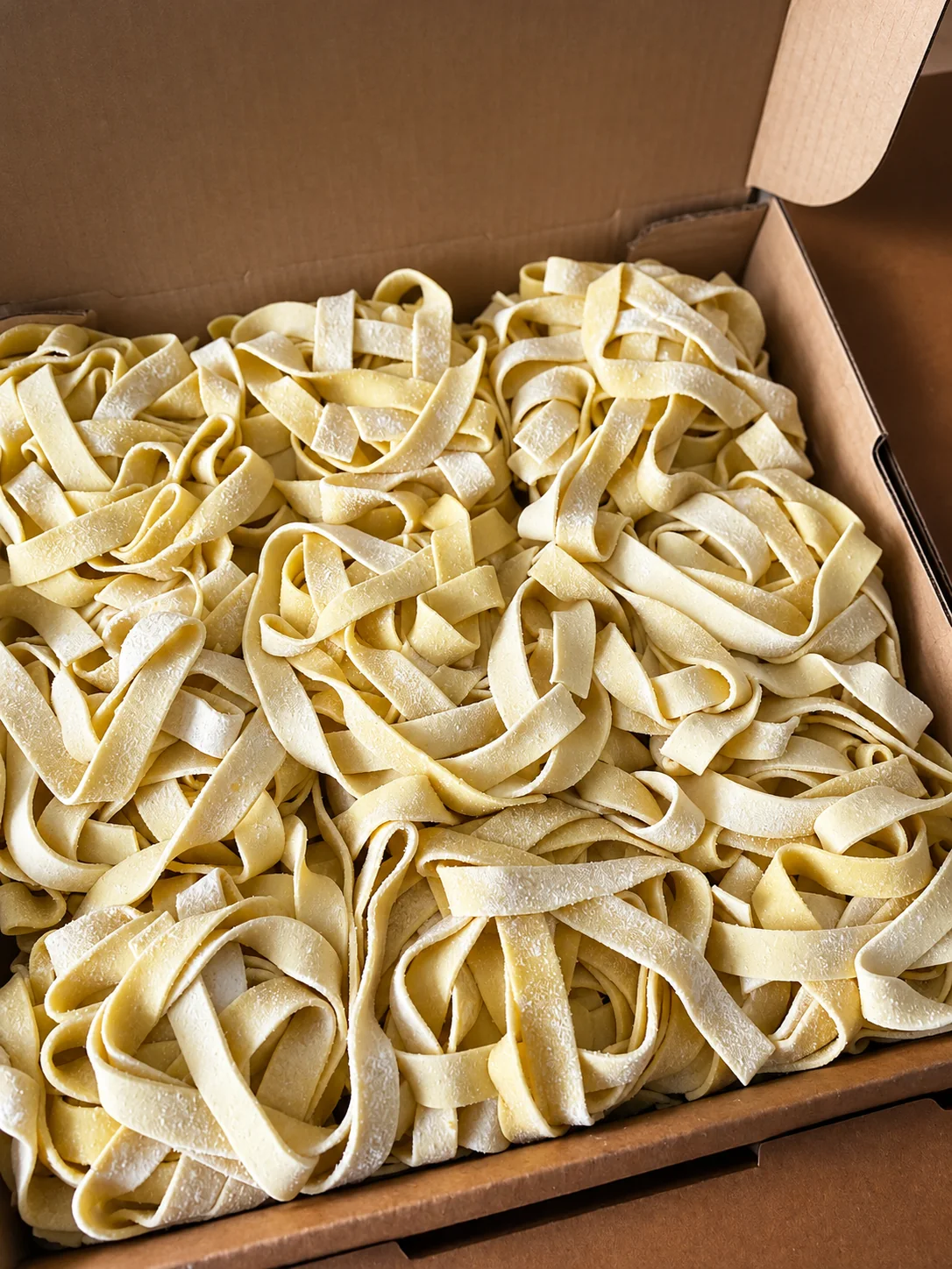 Fresh handmade tagliatelle packed in a Pastalicious box